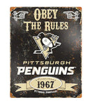 Penguins Obey Embossed Metal Sign